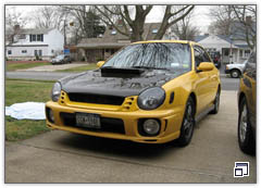 2003 Sonic Yellow WRX Sport Wagon with VIS CWII Carbon Fiber Hood and NRG Hood Struts 